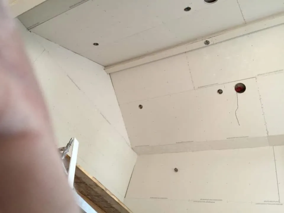 Active site with drywall dust and mudded wall corners
